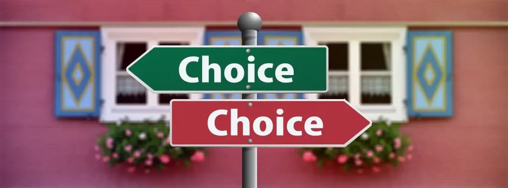 Two signs, one red and one green. Each one says the word "Choice" on it