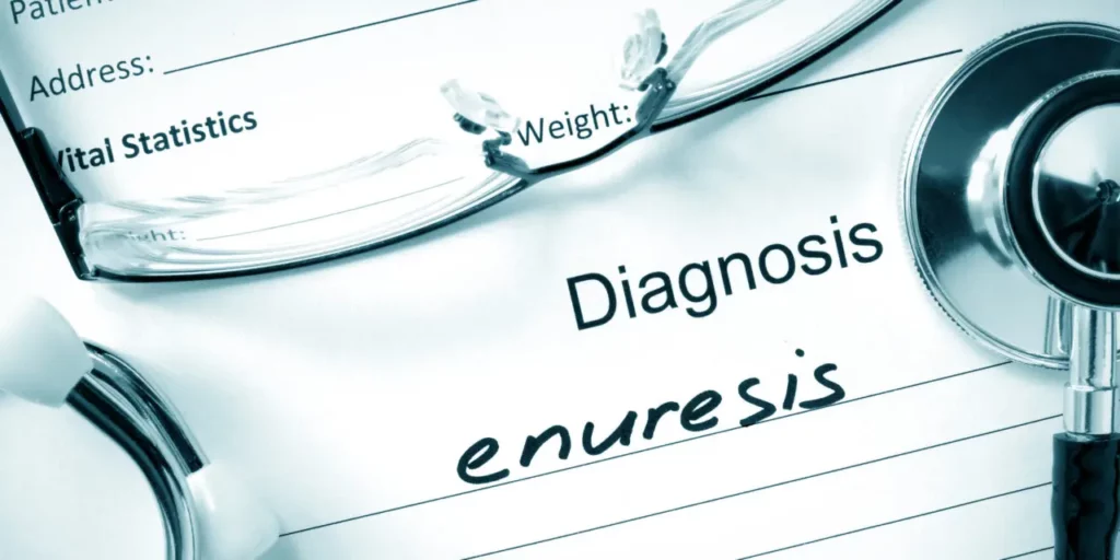 Medical sheet with a diagnosis that states "Enuresis"